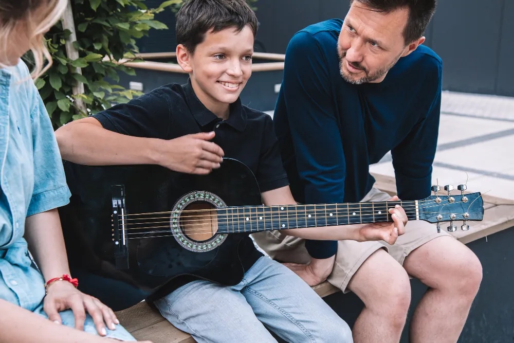 Boy playing guitar